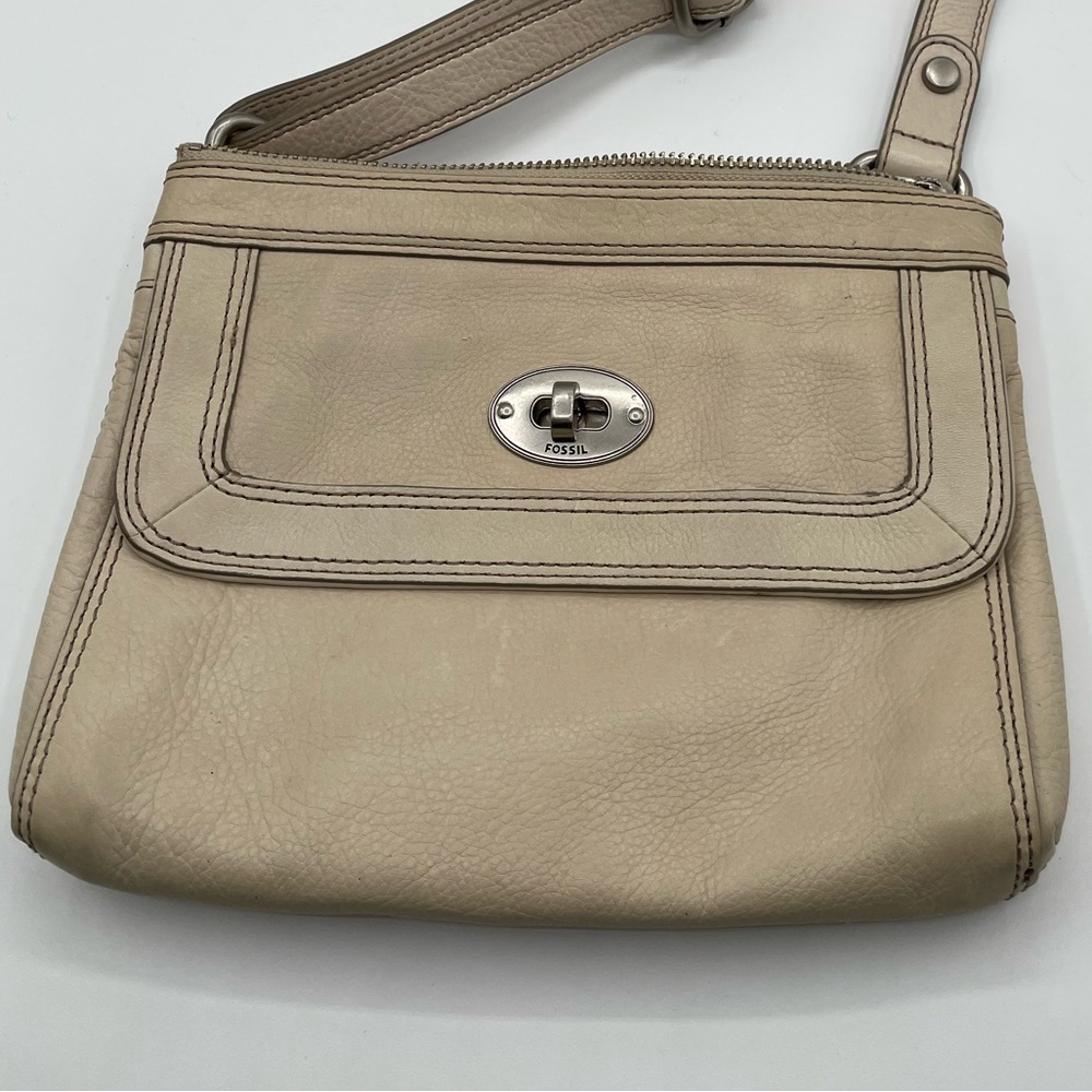 Fossil cross body bag. Ivory color minimal wear and tear genuine leather